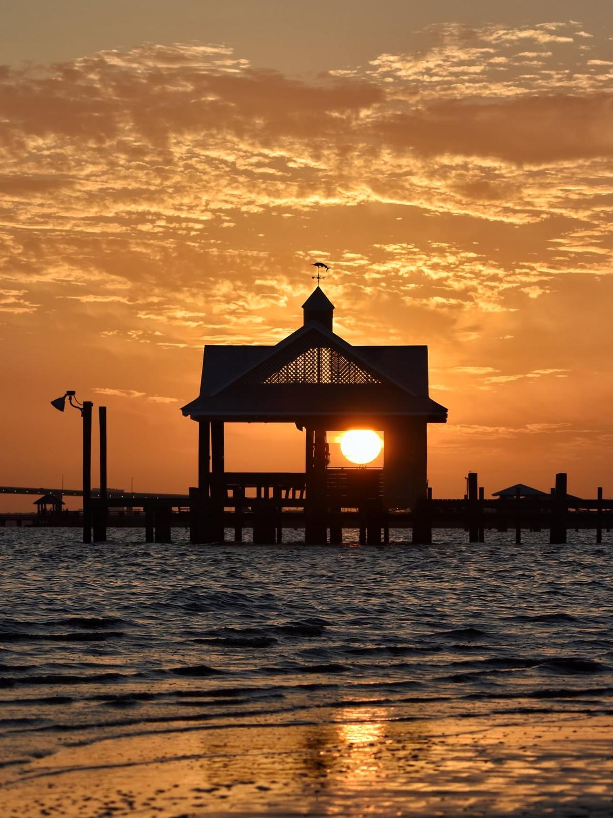 Golden hour over a coastal pier
